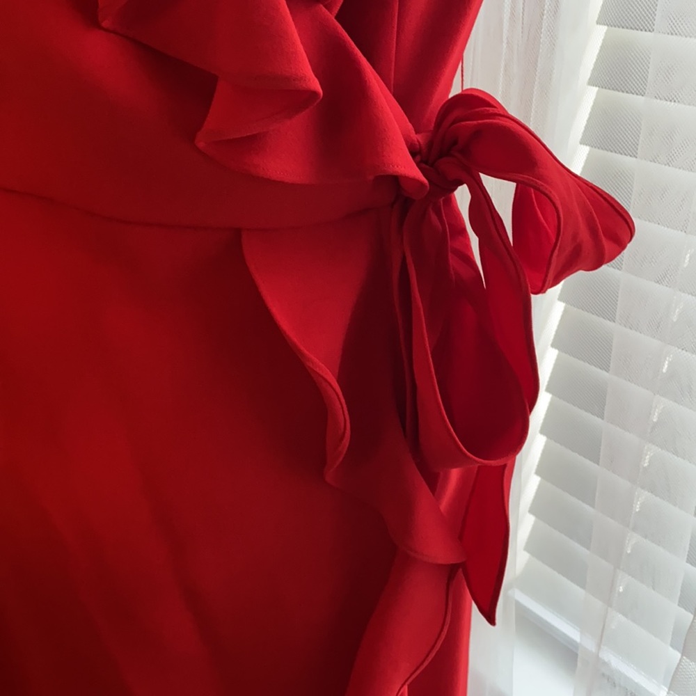 Red wrap dress with side tie and ruffled neck line. - Picture 3 of 4